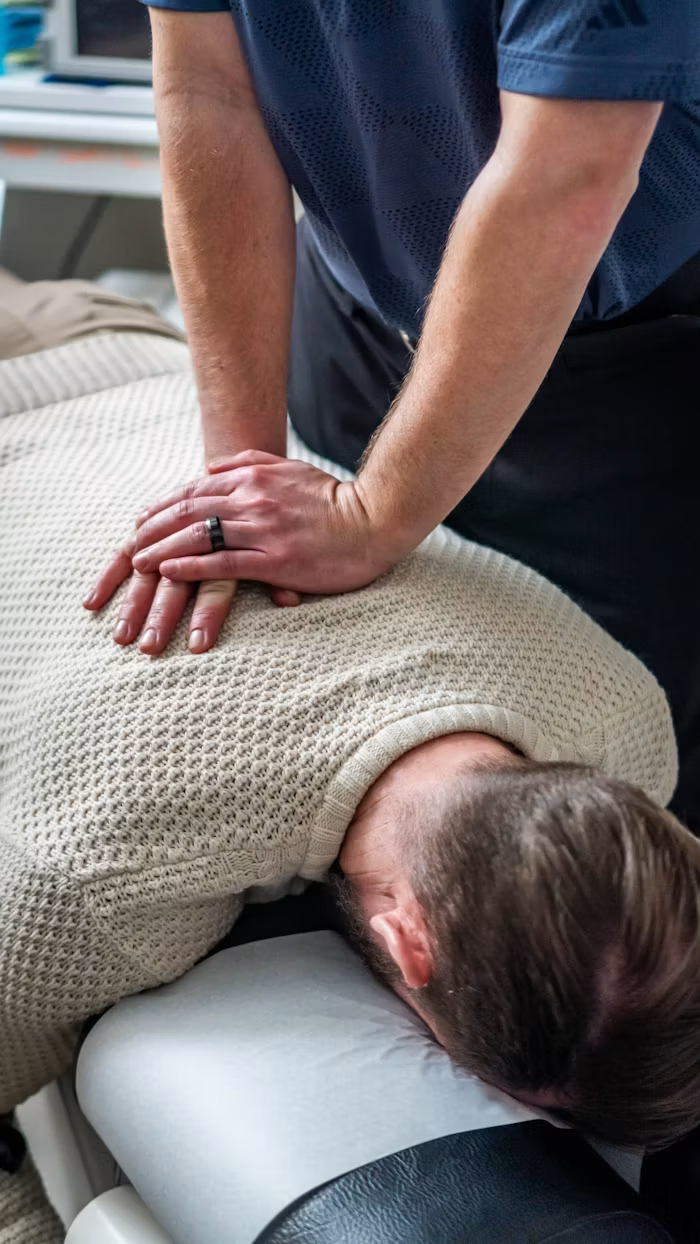 Chiropractor performing a precise, professional adjustment